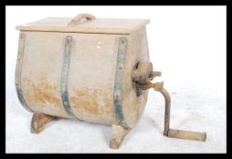 An unusual 19th century country French provincial Butter Churn from Brittany. The barrel of shaped