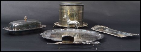 A collection of silver plated items to include a muffin warmer by a silver plated salver, butter