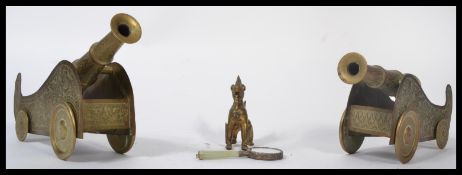 A collection of brass-wares to include a pair of C