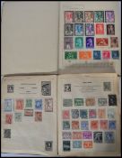 Two vintage stamp albums containing World stamps d