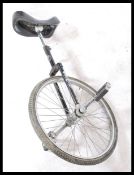A 20th century retro unicycle in black colour way by Pashley to include the original seat and