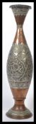 An early 20th century Indian / Islamic copper and silver overlaid floor standing ashtray having