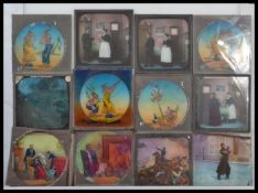 A vintage wooden magic lantern slide case full with vintage magic lantern slides, including mostly