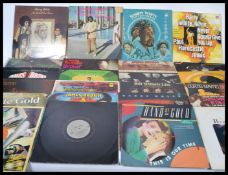 A collection of vinyl long play LP record albums dating from the 1970's to include Stevie Wonder,