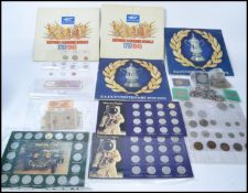 A collection of coins and notes dating from the 19th century from all around the world