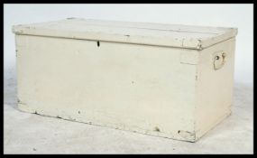 A 19th century Victorian painted pine blanket box / chest on plinth base, with hinged cover.