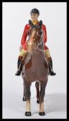 Beswick; a good vintage Beswick made ' Huntsman 1501 ' ceramic figurine. Depicting a fox huntsman