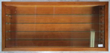 A good 20th century wooden glazed model train / diecast model display cabinet. Four glass shelves (
