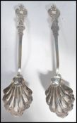 A pair of American silver 13/16 purity serving spo
