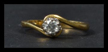 A hallmarked 18ct gold and diamond solitaire ring