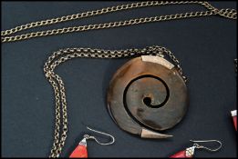 A large 925 silver pendant necklace strung with a