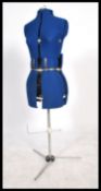 A vintage 20th century retro shop - haberdashery dress makers mannequin of adjustable form raised on