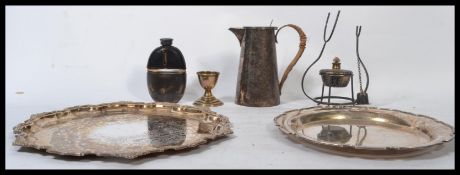 A group of vintage silver plated wares to include a chocolate pot with wicker handle , brandy