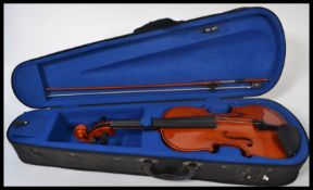Violin ; a contemporary entry-level Violin. Appears largely in very good condition (missing bridge).