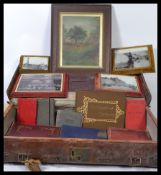 Solid Leather large antique suitcase with various Victorian/Edwardian effects (photographs,