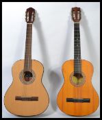 Two vintage Spanish style acoustic guitars - the first being an Encore, the other a Jose Ferrer ' El