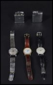A group of vintage watches and Ronson lighters to include Times watch Sekonda Trident watch and a