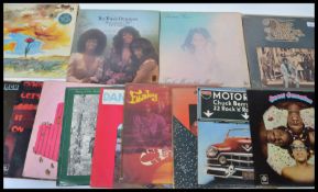 A collection of vinyl long play LP records featuring several artists to include Melvin Van