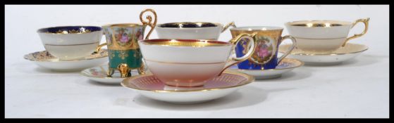 A collection of bone China cabinet cups and saucers / trio's to include Aynsley, Paragon etc