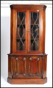 A good quality mahogany Georgian revival corner ca