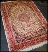 A large Iranian / Persian Keshan carpet - rug having beige ground with geometric decoration and