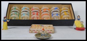 A collection of items to include a boxed set of 1950's glasses, a boxed set of glass cocktail /