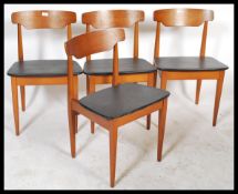 EON - Elliotts of Newbury - A set of four 1970's retro teak wood propeller dining chairs, the