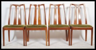 A set of four mid 20th Century vintage / retro teak wood slat back dining chairs by ' Nathan '