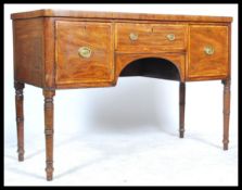 A 19th century Gerogian mahogany inlaid sideboard dresser of smaller proportions having a central