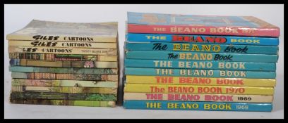 A collection of vintage 20th century Giles books along with a collection of vintage Beano annuals.
