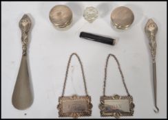 A collection of silver hallmarked items and plated items to include a Cheroot holder, shoe horn