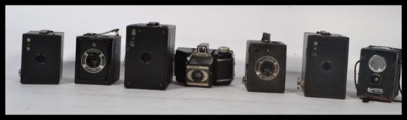 A collection of vintage cameras to include a Kodak No2 Brownie 116 film Britain , No2 Brownie 116