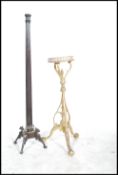 A 19th century Regency gilt wood plant stand torchere having a stunning upright column on splayed