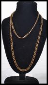 A 9ct gold hallmarked figaro necklace, fitted with lobster clasp measuring 58 cm in length and