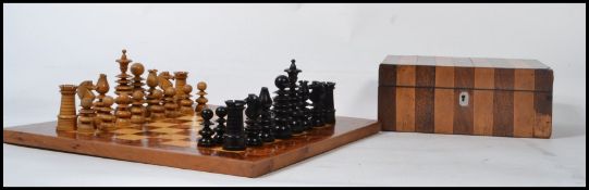 A vintage 20th century turned wood chess set in the manner of Calvert of London complete with