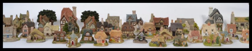 A large collection of approx 40 Liliput lane cottages. Please see images. Highest measures 11.5 cm.