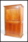 A 20th century hard wood, believed mahogany fall front bureau abbatant of tall proportions, fully