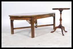 A good quality antique style mahogany inlaid coffee table raised on squared, oval top with inlaid