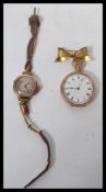 A ladies vintage 20th century 9ct gold hallmarked cocktail watch together with a 10ct gold plated