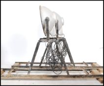A fabulous set of very large heavy grade spot lights - search lights being raised large railed