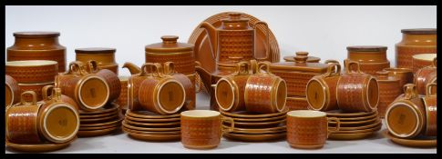 An extensive collection of Hornsea Saffron china from the 1970's to include dinner plates, cups,