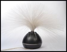 A Russian made retro fibre optic lamp, circa 1970, moulded translucent black plastic case,