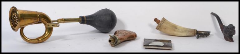 A group of vintage items to include a P.A carved pipe in the form of a dog , a brass and rubber side