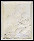 A vintage early 20th century cast plaster oversized wall hanging plaque of Madonna and Child