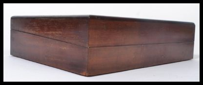 A vintage early 20th century mahogany and glass paneled counter top advertising point of sale shop