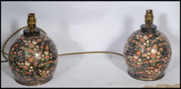 A pair of 20th century papier mache cloisonne tabl