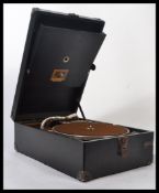 A 1930's HMV picnic portable gramaphone model no 101 having fully appointed interior with swivel key