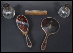 A stunning 20th century Edwardian silver hallmarked and tortoiseshell dressing table set