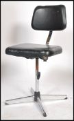 An excellent mid 20th century machinists chair with cast metal base with peripheral stretcher base