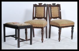 A pair of early 20th century Arts and Crafts Edwardian bedroom / dining chairs raised on turned legs